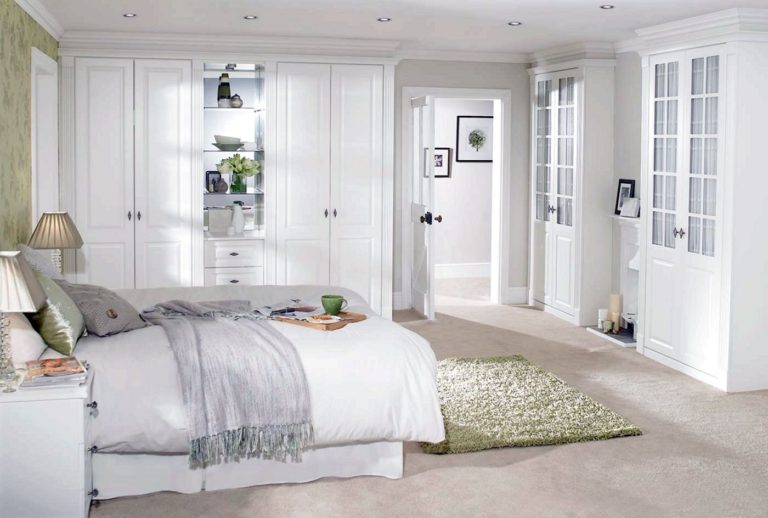 All White Bedroom Design With Rugs To Feel Warm While Winter