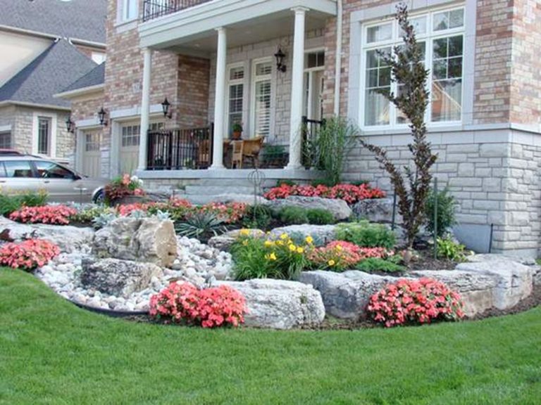 Rustic Flower Beds With Rocks In Front Garden