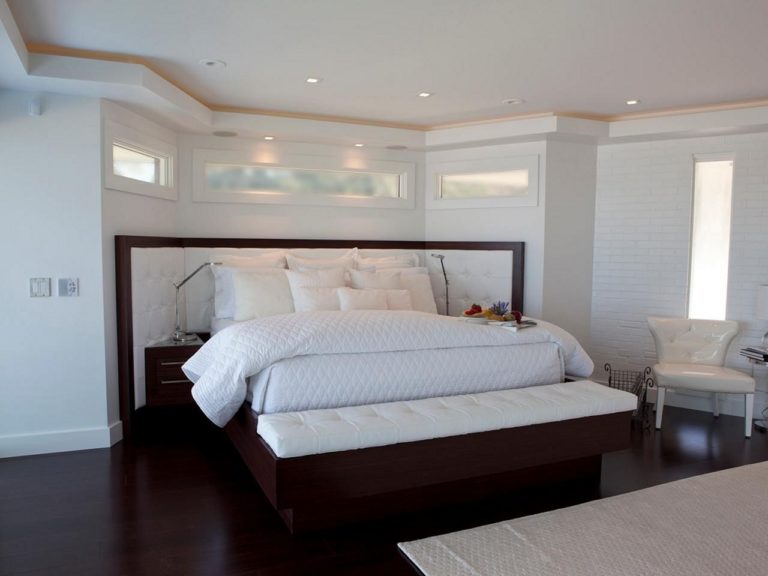 White Modern Bedroom With Dark Wood Floors